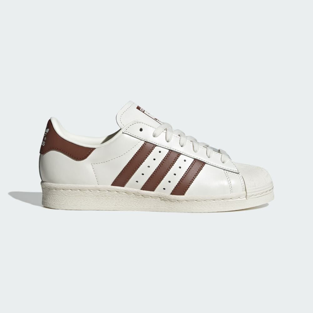 

Кроссовки Adidas SUPERSTAR 82, цвет Cloud White/Pre-Loved Brown/Off White