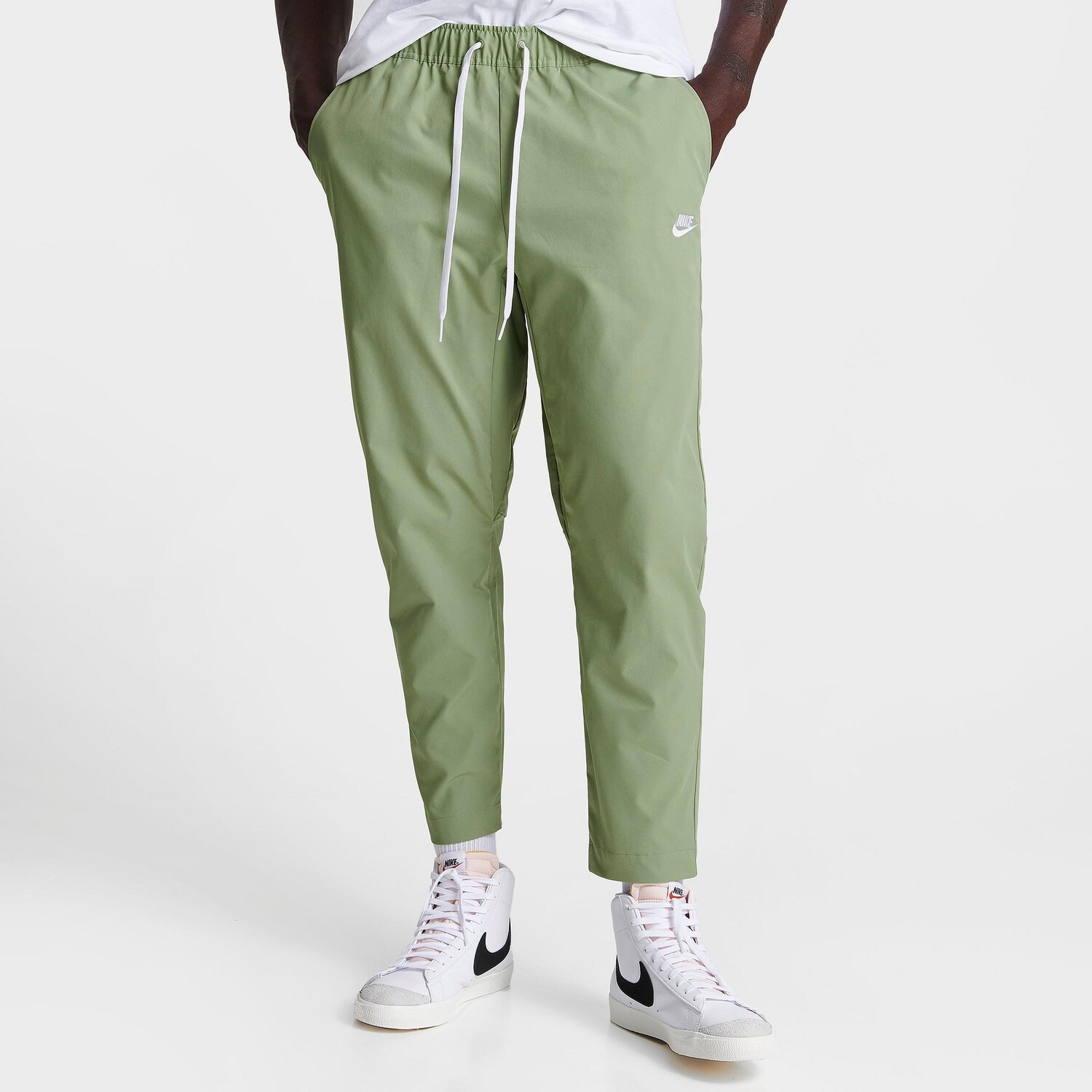 

Мужские тканые зауженные брюки Nike Club, зеленый