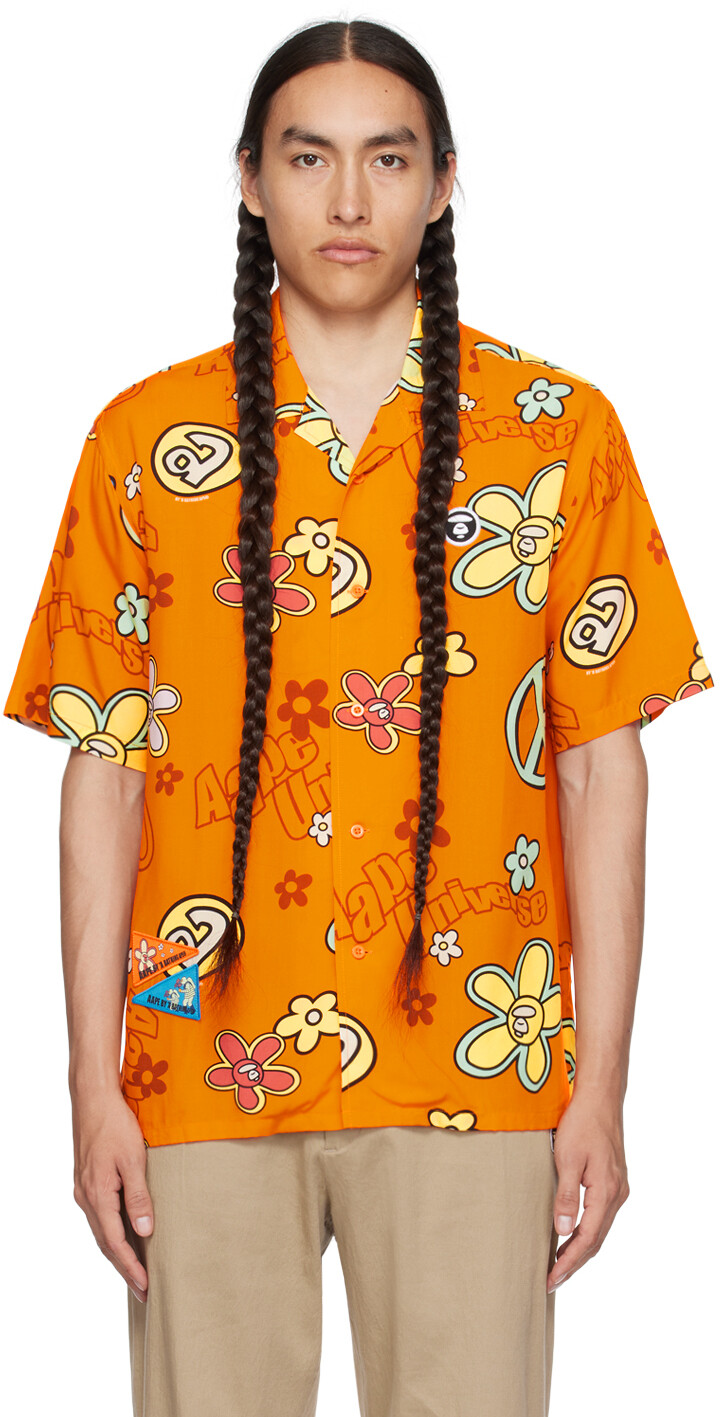 

Оранжевая рубашка с лунным лицом AAPE by A Bathing Ape