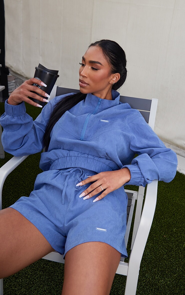 

PrettyLittleThing Синяя спортивная персиковая куртка на молнии до половины