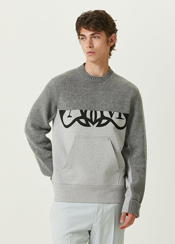 

Серый шерстяной свитер Alexander McQueen