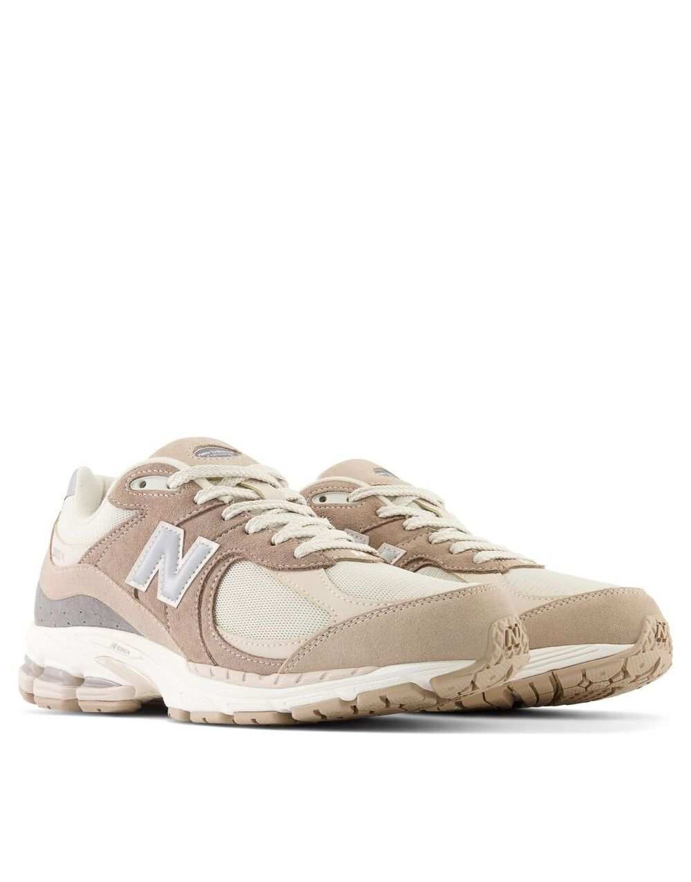 

Бежево-серые кроссовки New Balance 2002, Серый