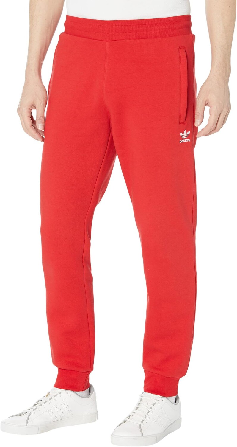 

Брюки Trefoil Essentials adidas, цвет Better Scarlet