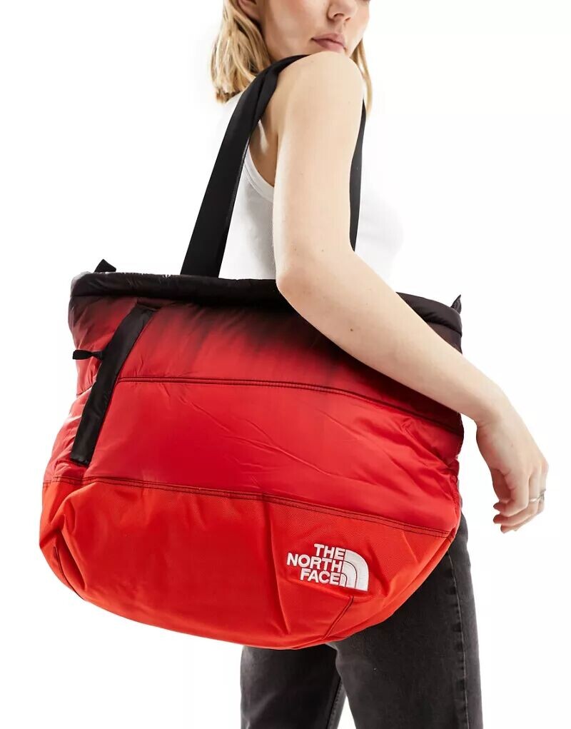 

Красная пуховая сумка с пухом и наполнением The North Face Nuptse