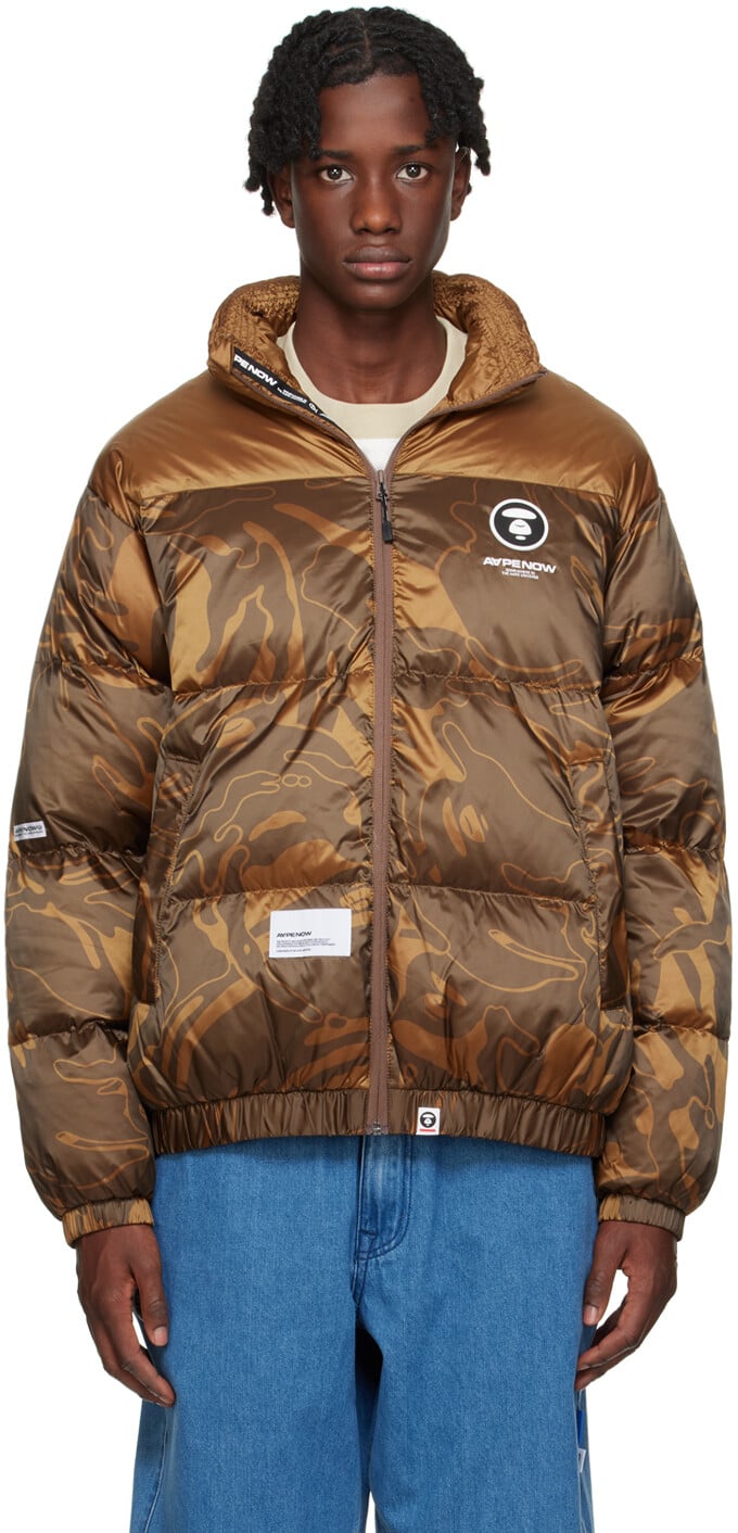 

Коричневый пуховик с принтом Aape By A Bathing Ape