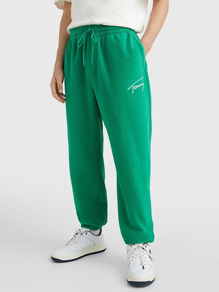 

Яркие брюки из полярного флиса Tommy Jeans