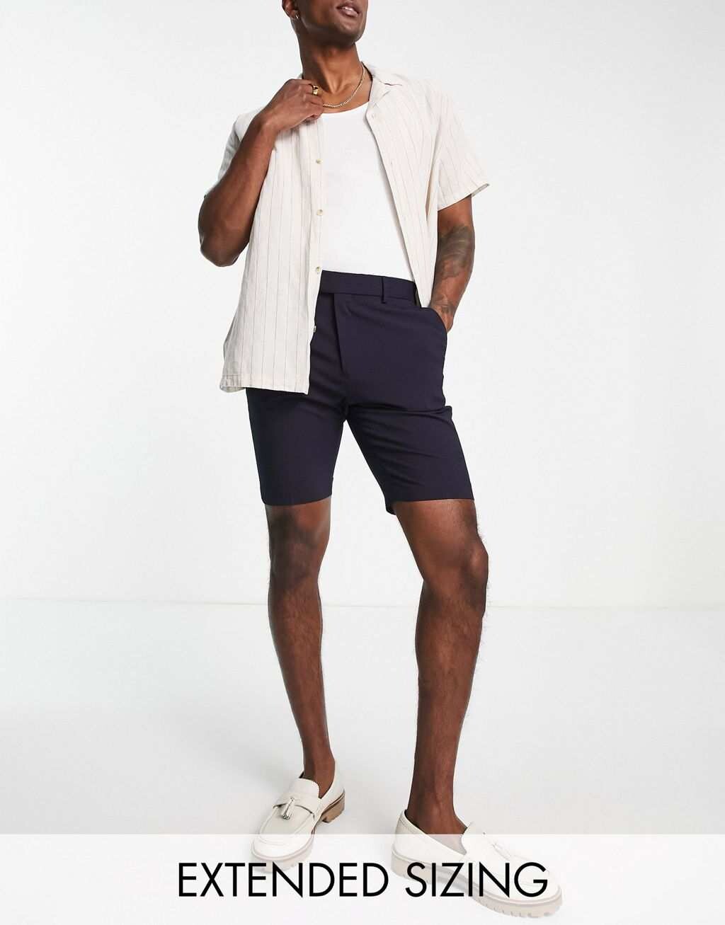 

Темно-синие узкие шорты ASOS DESIGN