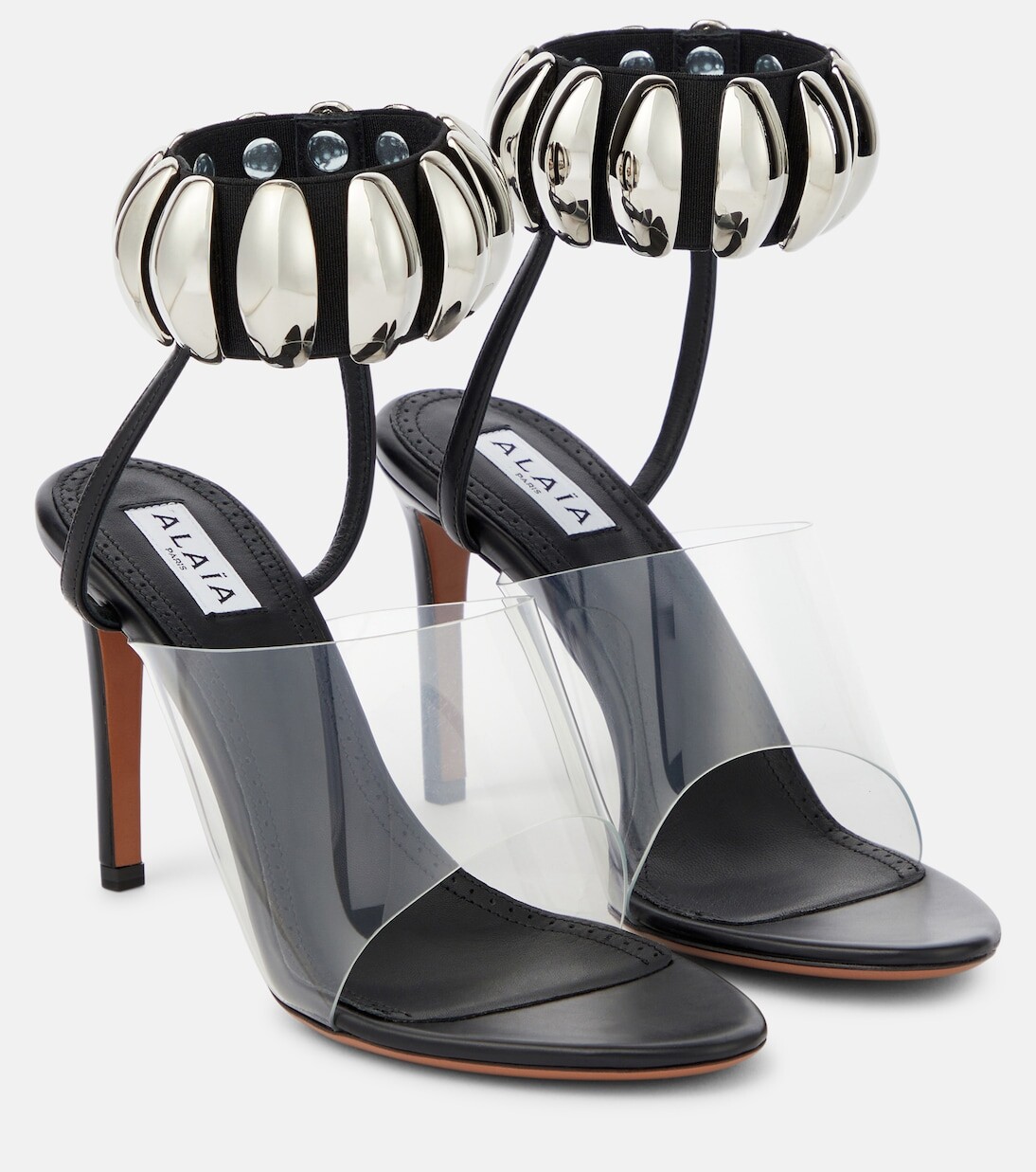 

Сандалии из кожи и искусственной кожи с украшением Alaïa, черный