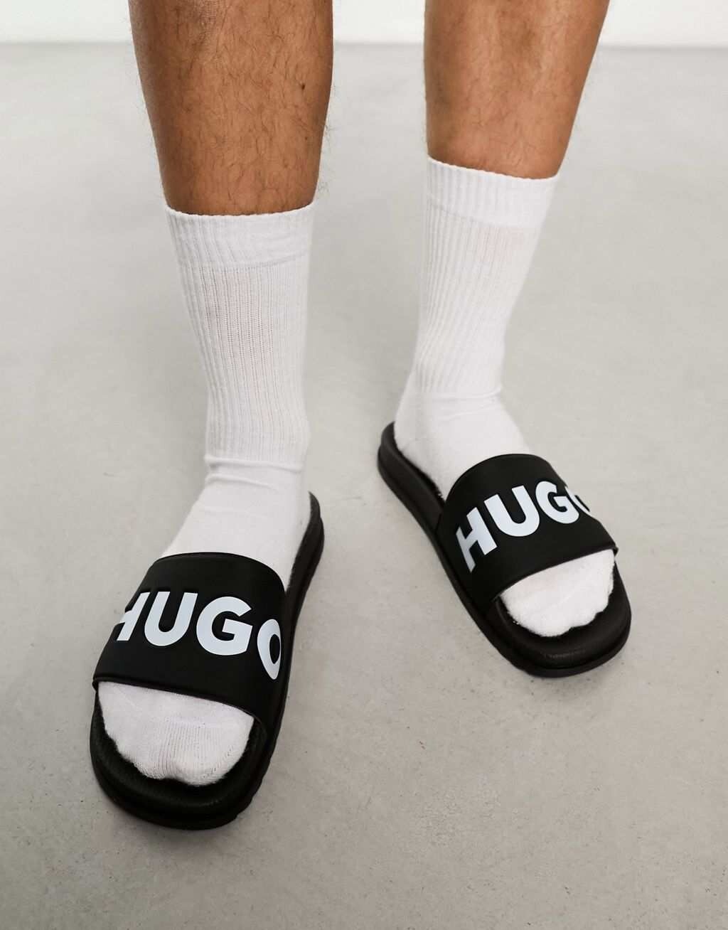 

Черные шлепанцы HUGO Match it