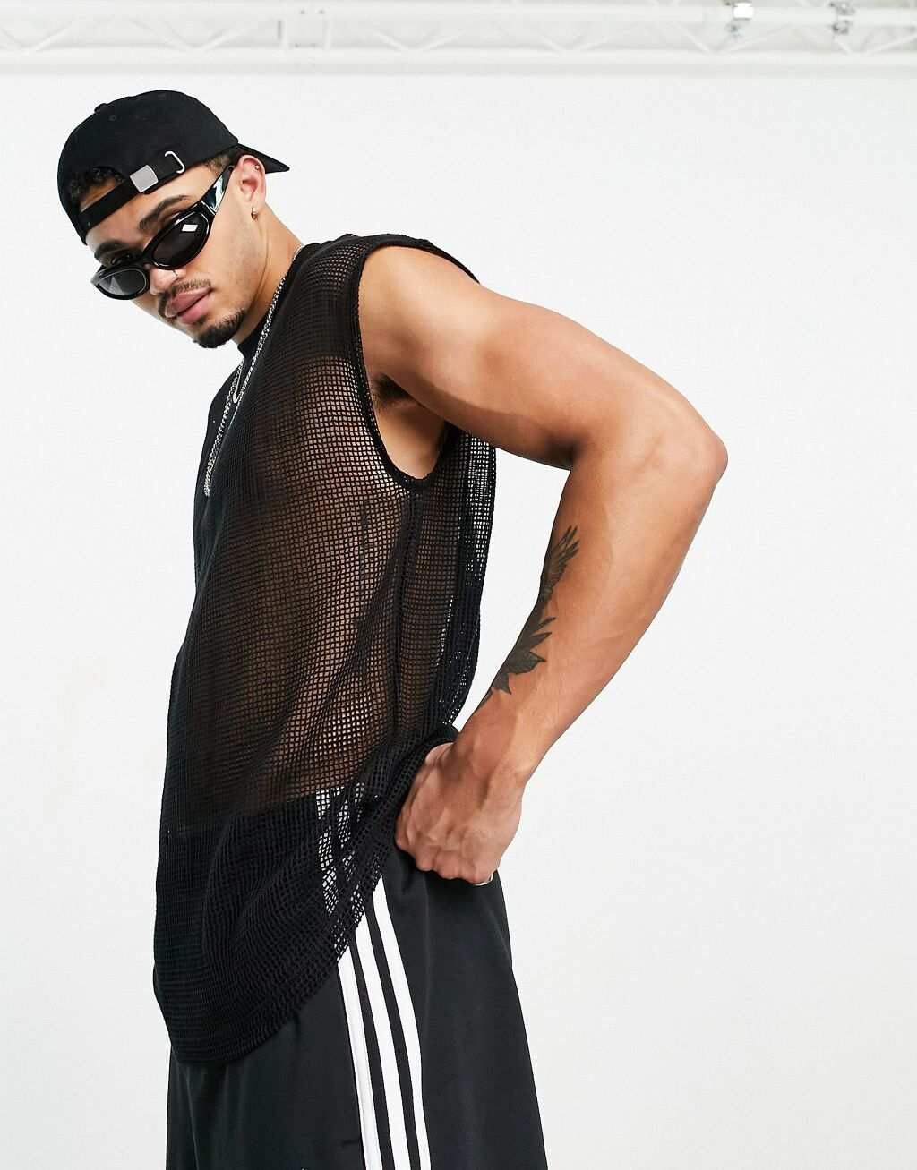 

Большой жилет из черной сетки ASOS DESIGN