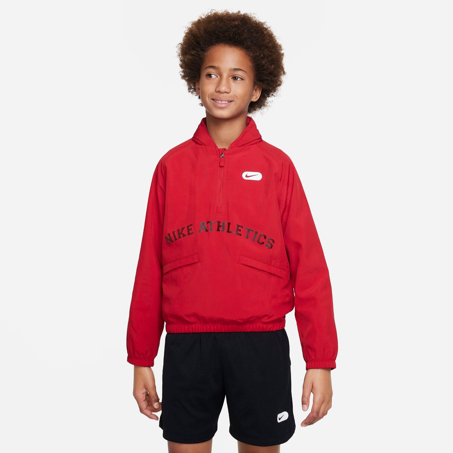 

Детская тканая тренировочная куртка с молнией до половины длины Nike Athletics Repel, красный