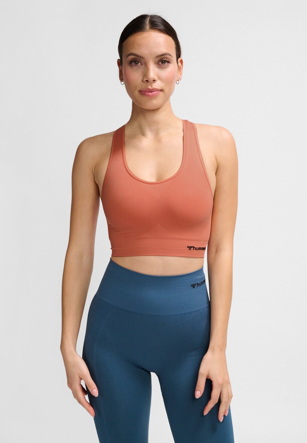 

Спортивный бюстгальтер средней поддержки TIF SEAMLESS Hummel, цвет apricot