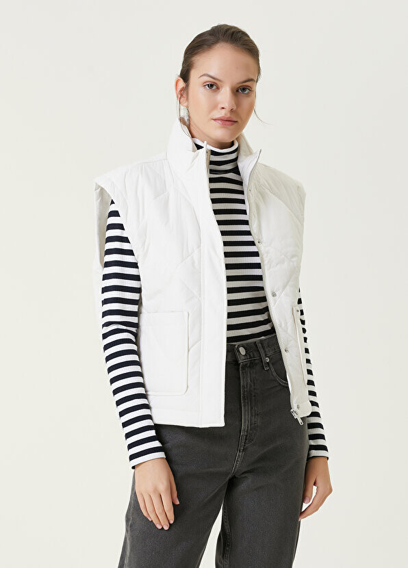 

Белый стеганый жилет Tommy Jeans