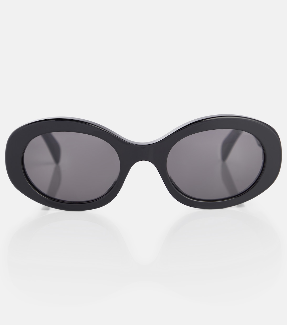 цена Солнцезащитные очки в овальной оправе Triomphe 01 Celine, черный