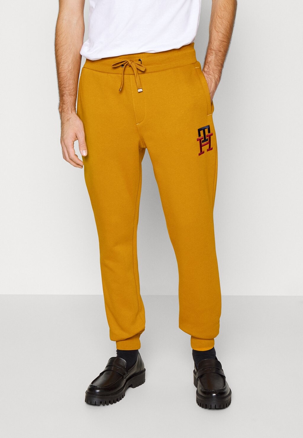 

Спортивные брюки ESSENTIAL MONOGRAM Tommy Hilfiger, герб золотой