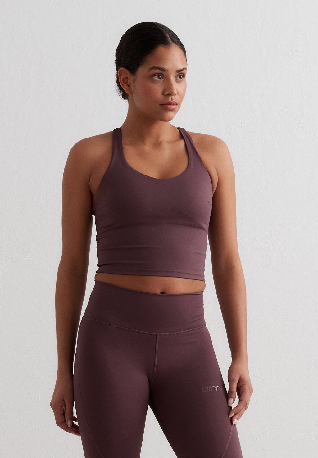 

Спортивный бюстгальтер с легкой поддержкой SCULPTING STRAPPY aim’n, цвет dawn