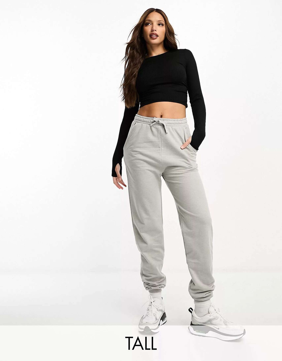 

Черный спортивный топ с длинными рукавами и рюшами ASOS Tall