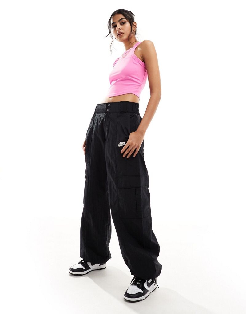 

Укороченный топ без рукавов Nike Dri-FIT One (игривый розовый)