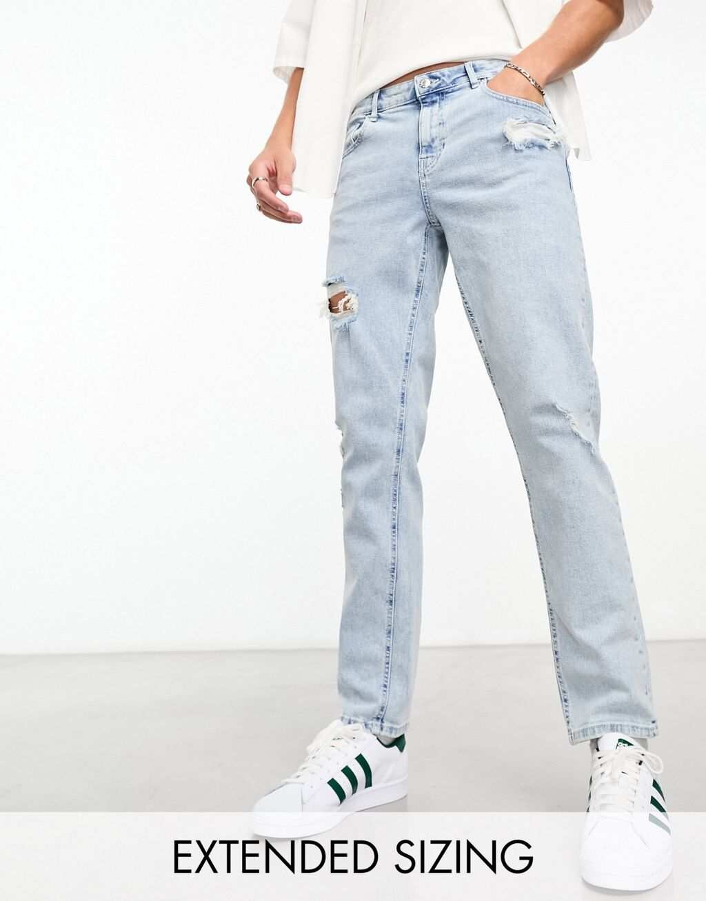 

Светло-голубые эластичные узкие джинсы с рвами ASOS DESIGN