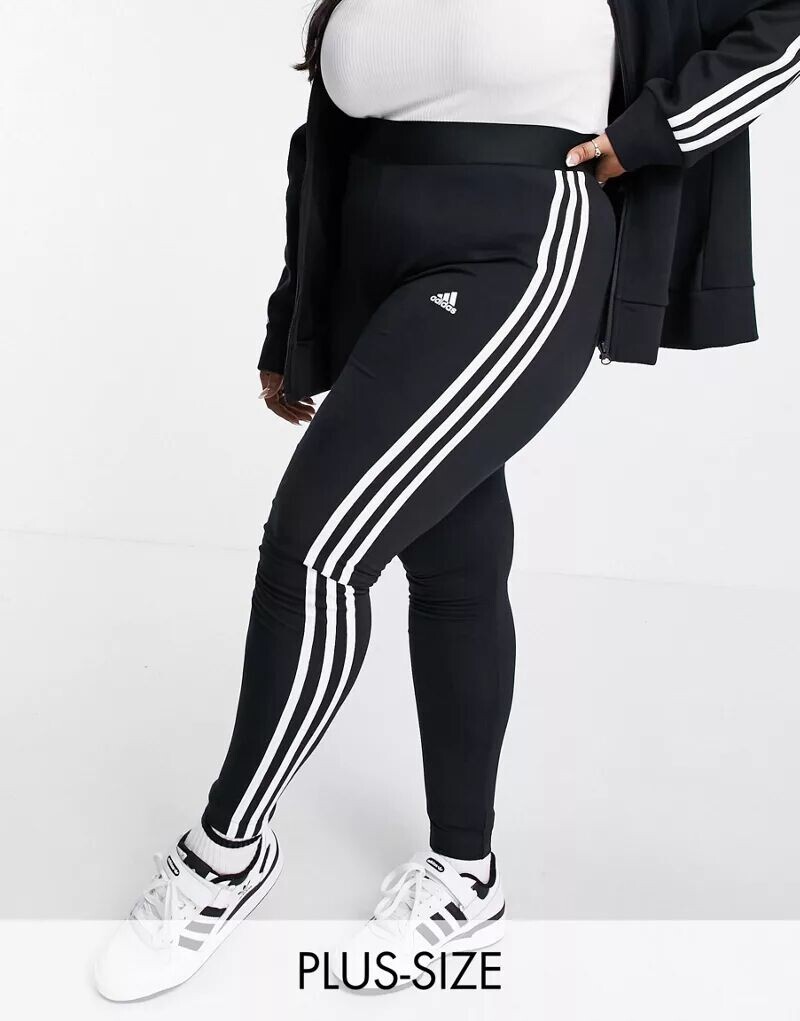 

Черные леггинсы с тремя полосками adidas Sportswear Plus Essential adidas performance