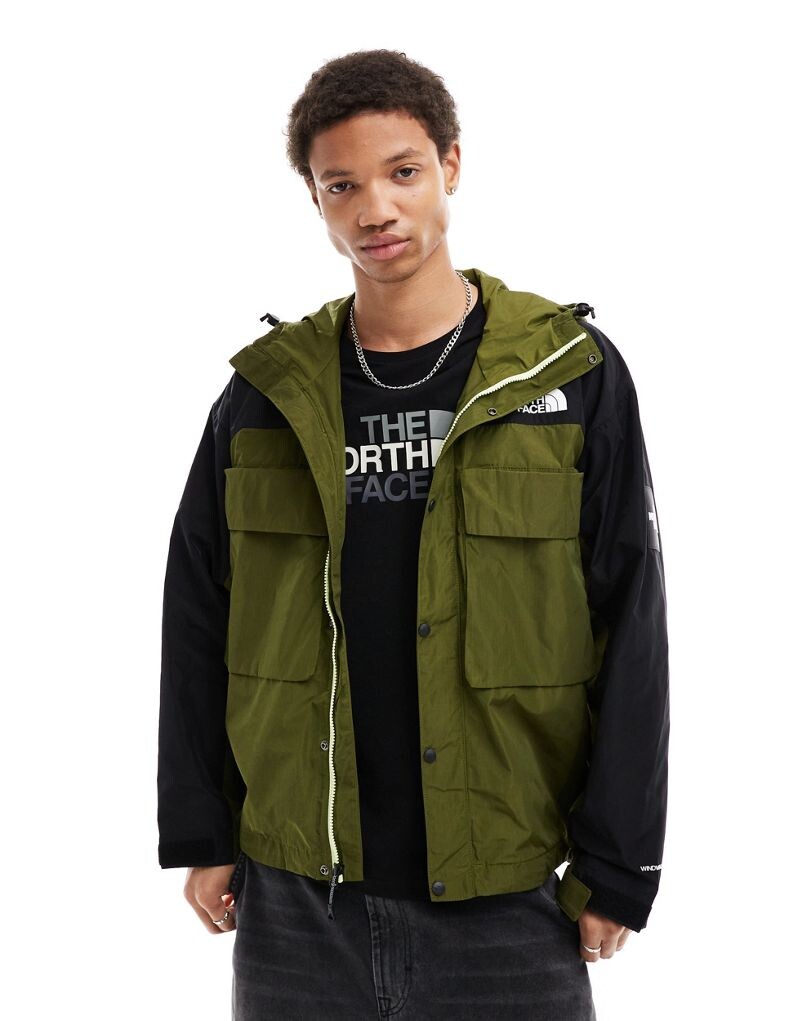 

Оливковая куртка с карманами The North Face NSE Tustin