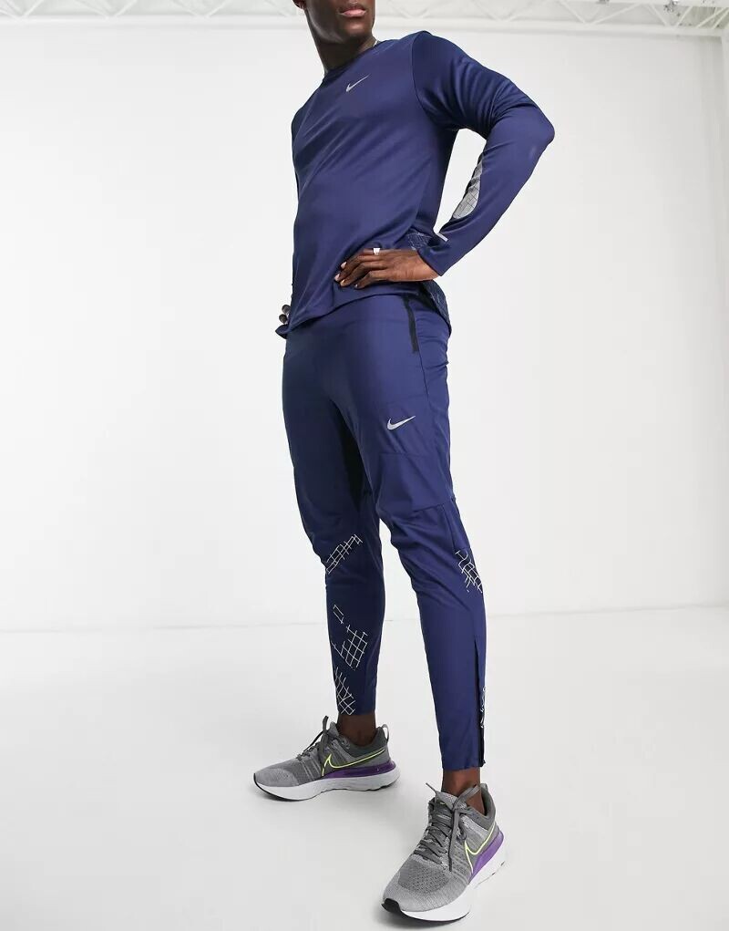 

Темно-синие джоггеры со светоотражающими элементами Nike Run Division Phenom Elite Flash