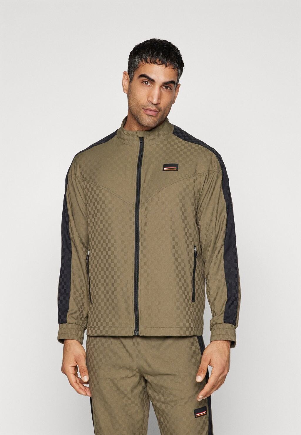 

Спортивная куртка West Division Jacket P.E Nation, хаки