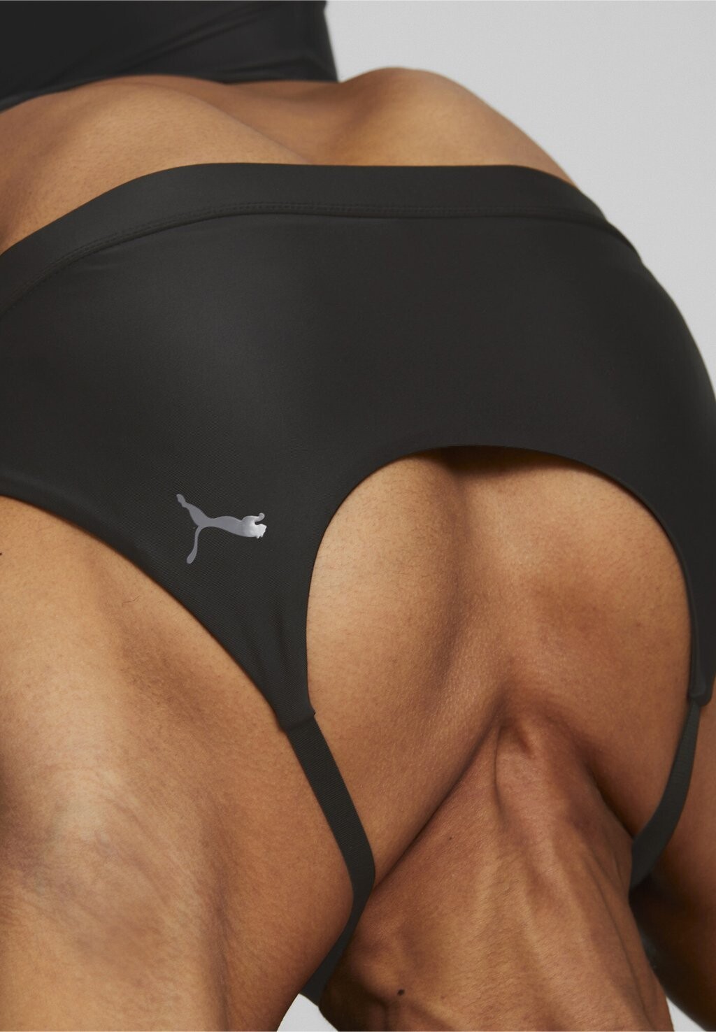 

Спортивный бюстгальтер с легкой поддержкой Puma