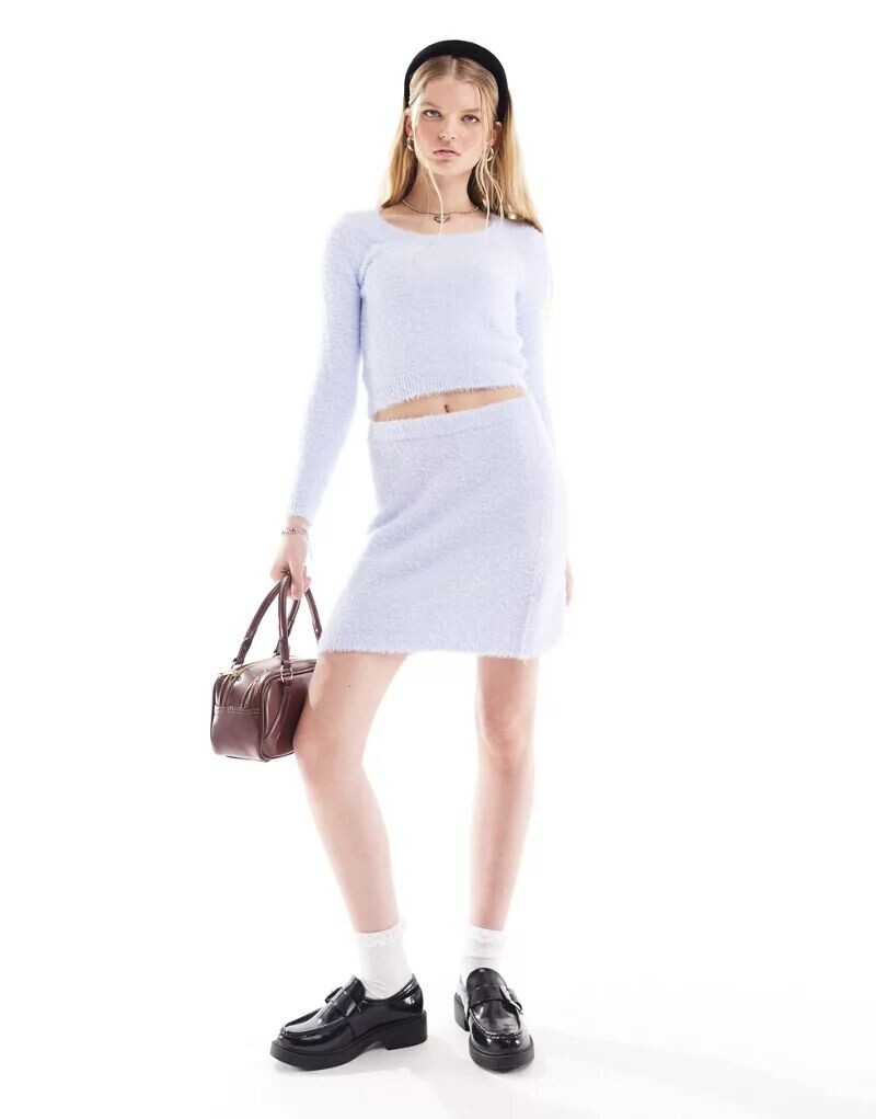 

Мини-юбка Monki из пышного трикотажа голубого цвета, комбинированная деталь