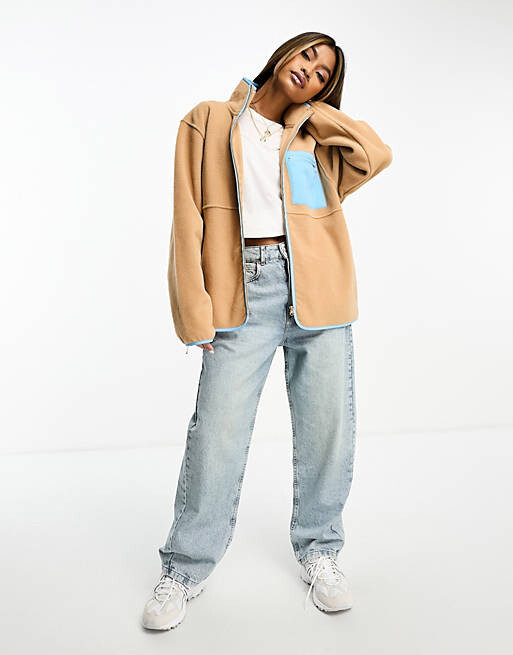 

Флисовая молния ASOS DESIGN с нейлоновым карманом нейтрального цвета.