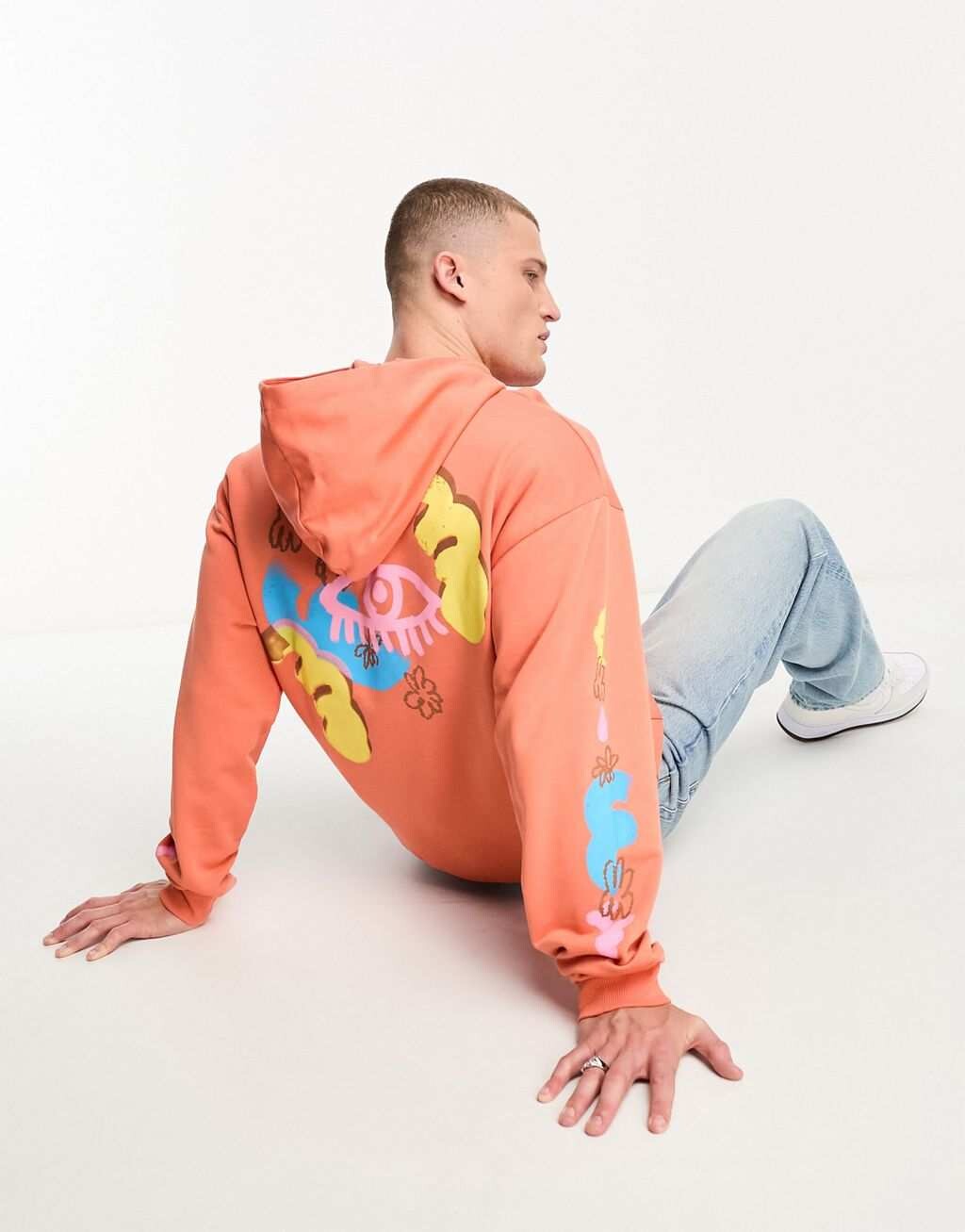 

Оранжевая толстовка оверсайз с принтом на спине и рукавах ASOS DESIGN, Оранжевый