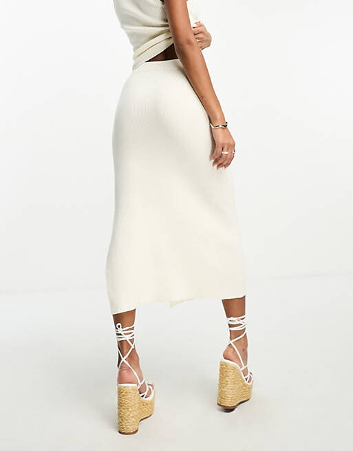 

Кремовая трикотажная юбка миди в рубчик ASOS DESIGN