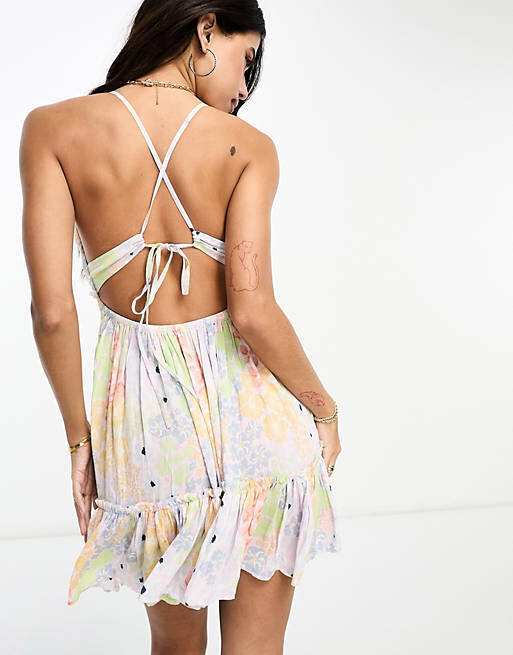 

Многоярусное пляжное платье скинни с завязками ASOS DESIGN в смешанный цветочный принт