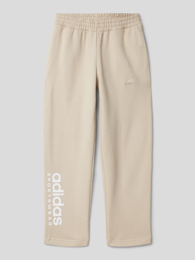 

Спортивные штаны с нашивкой-лейблом ADIDAS SPORTSWEAR, бежевый